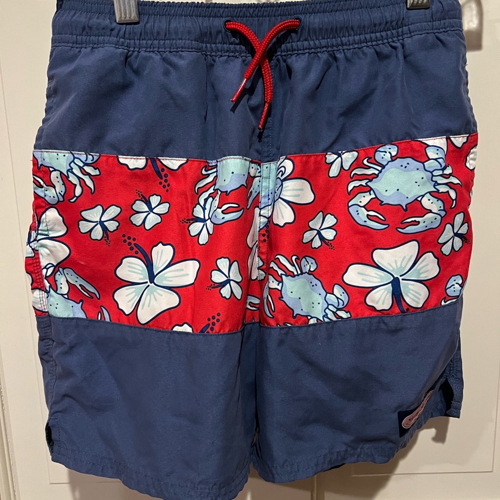 Vineyard Vines blue swim trucks with red crab print